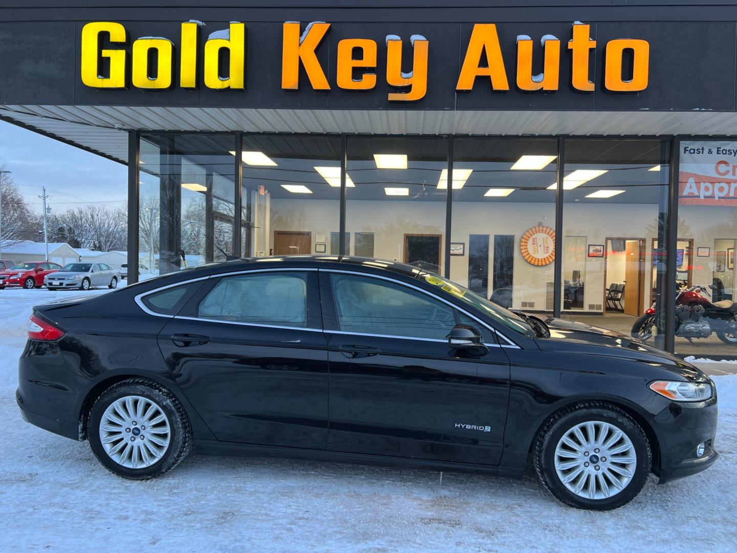 2016 Black Ford Fusion Hybrid (3FA6P0LU8GR) , located at 1633 W Kimberly, Davenport, IA, 52806, (563) 323-5341, 41.559456, -90.598732 - Photo#0